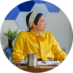 a woman at her work desk